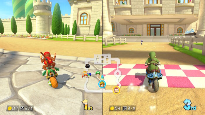 Mario Kart med to spillere. Skjermen er delt vertikalt.